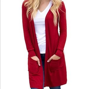 Long red cardigan with deep pockets. Worn once.
